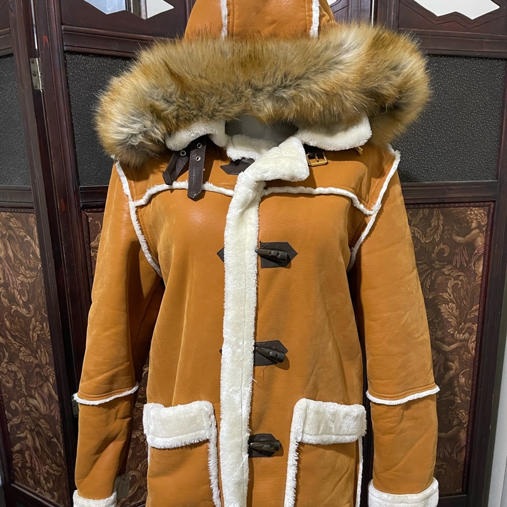 Real genuine, sheepskin coat, three-quarter inch only worn three times !